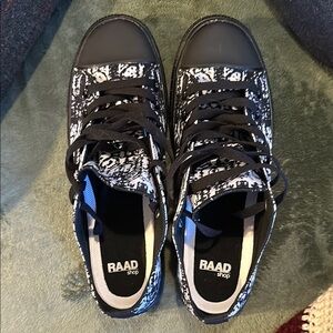 RAAD Shop Black and White Sneakers